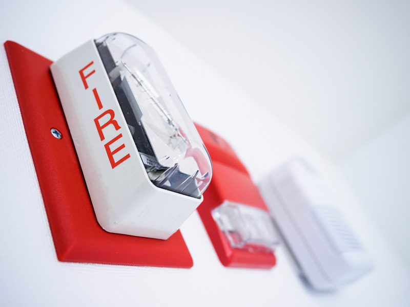 Image of a fire alarm on the wall